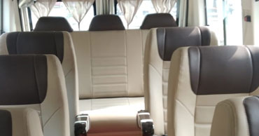 12 seater deluxe 1x1 tempo traveller with sofa seating for chardham yatra tour
