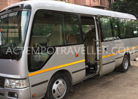 toyota coaster modified big modified seating mini coach hire in delhi