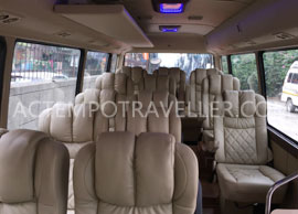 toyota coaster modified big modified seating mini coach hire in delhi india